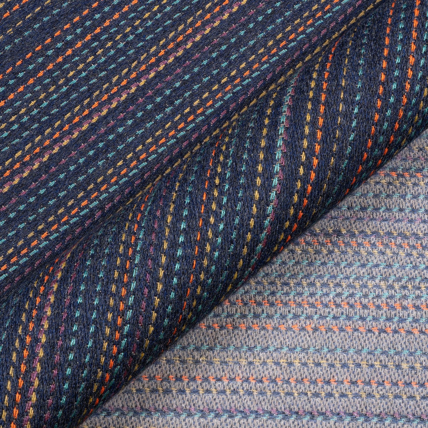 Close-up of textured fabric with multicolored pattern