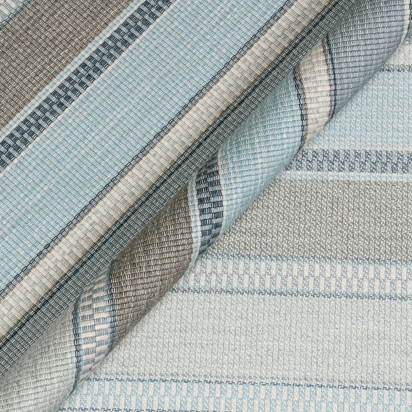 Close-up of textured fabric with blue and gray pattern