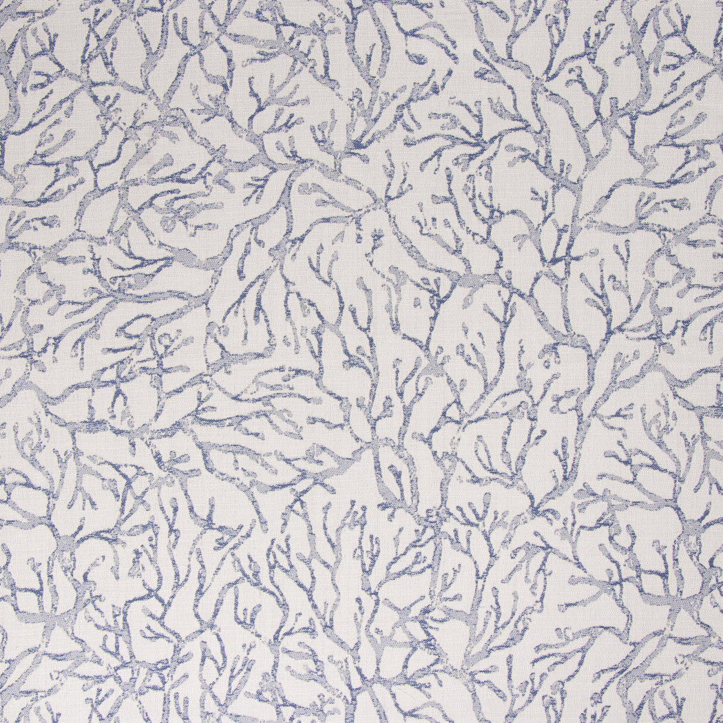 Coral Navy Patterned fabric with blue and white design on a light gray background