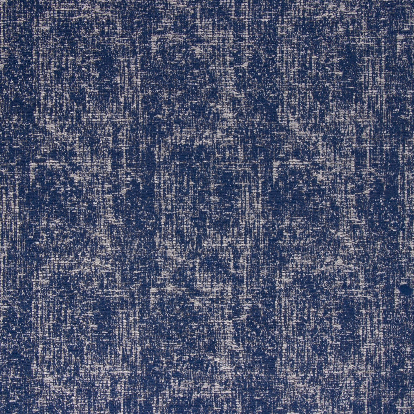 Close-up view of a blue outdoor umbrella fabric with a solid pattern and texture.