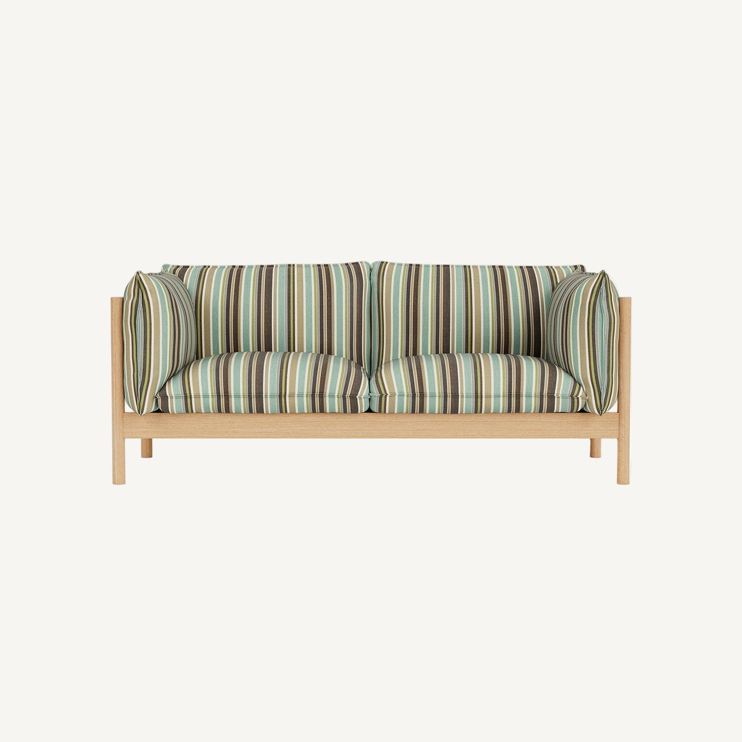 Sofa with striped cushions on a white background