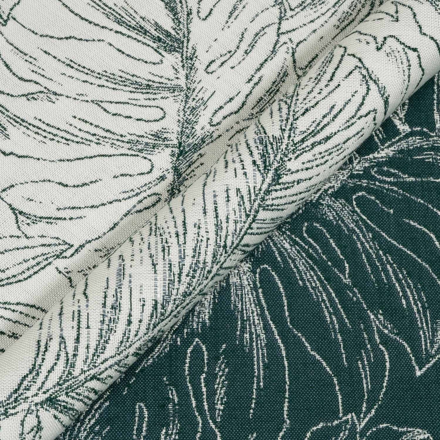 Close-up of fabric with leaf pattern in green and white