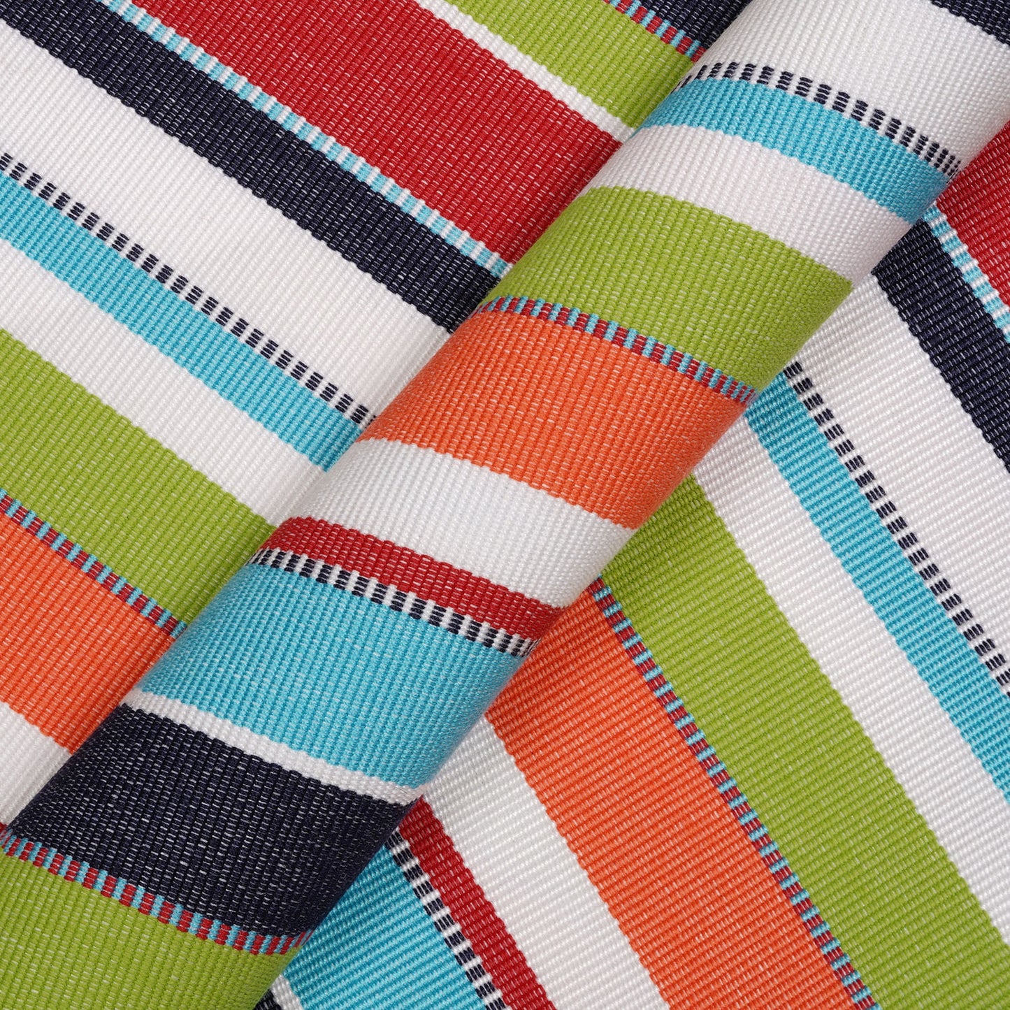 Close-up of colorful striped fabric with red, green, blue, and orange patterns.