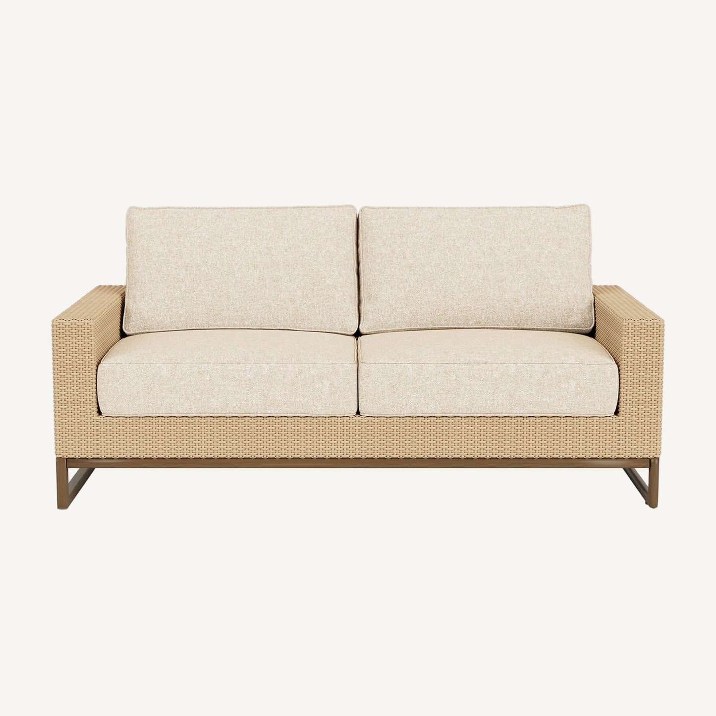 Beige outdoor sofa with wicker frame on a white background