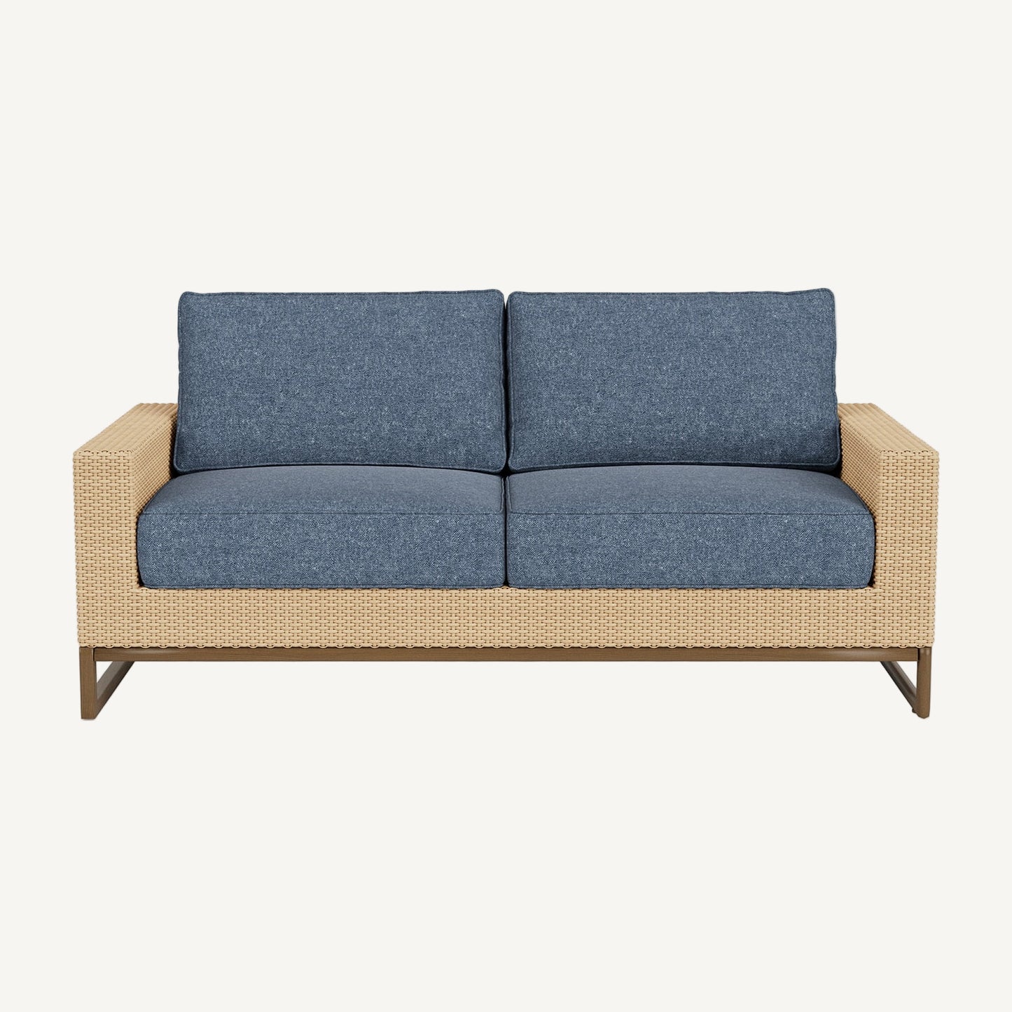Two-seater outdoor sofa with blue cushions and a wicker frame on a white background