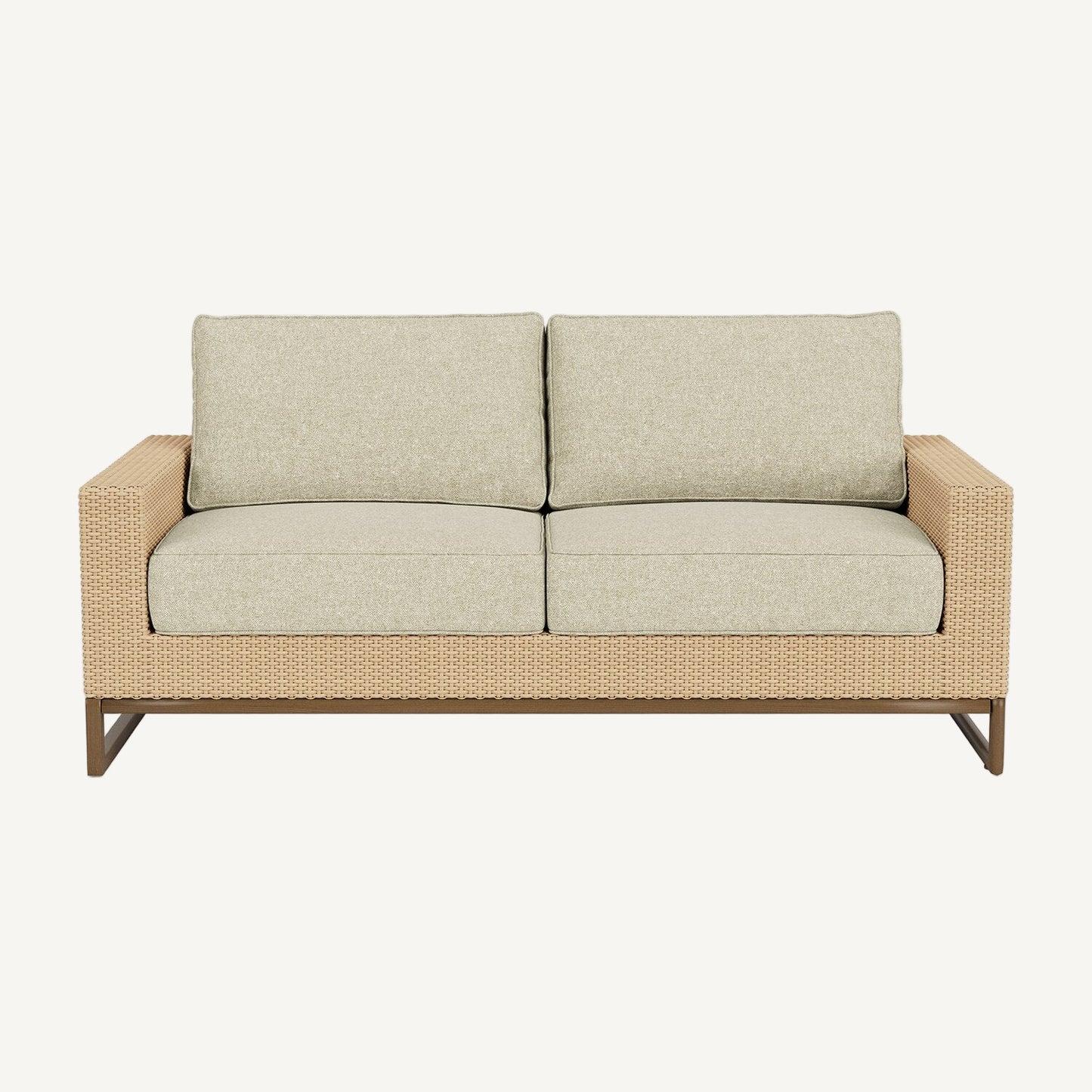 Beige outdoor sofa with wicker frame on a white background