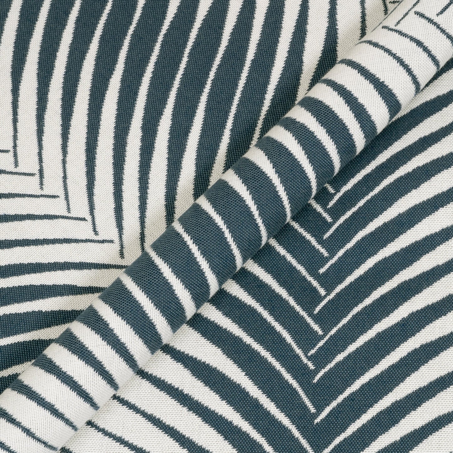 Close-up of fabric with blue and white striped pattern