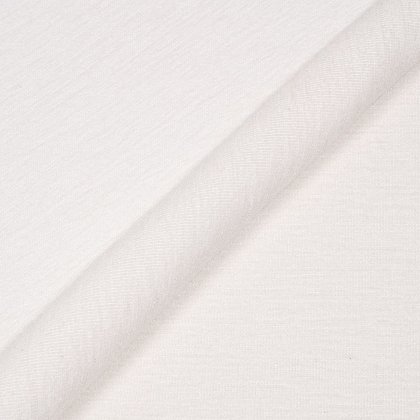 Close-up of white fabric with a subtle pattern
