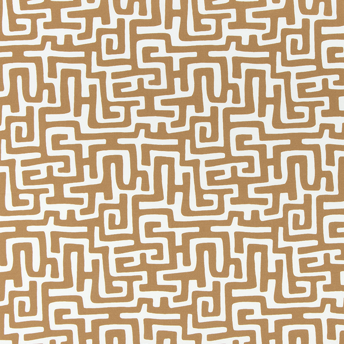Patterned fabric with white maze-like design on a beige background