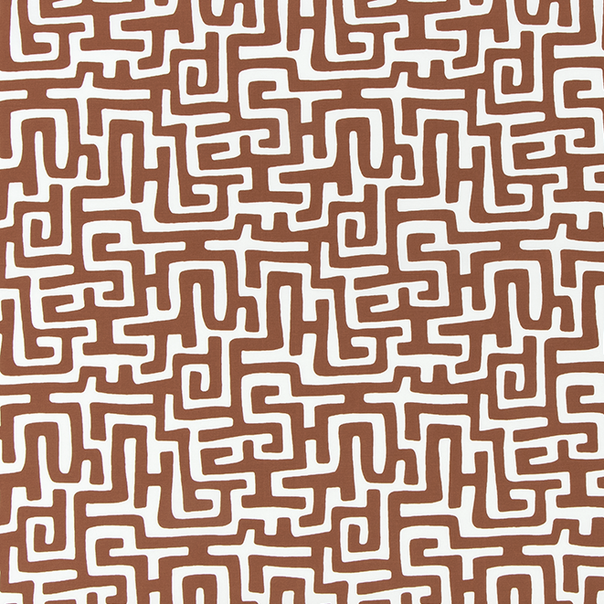Patterned fabric with maze-like design on a brown background