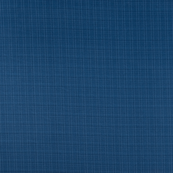 Blue fabric texture with a grid pattern on a wooden surface