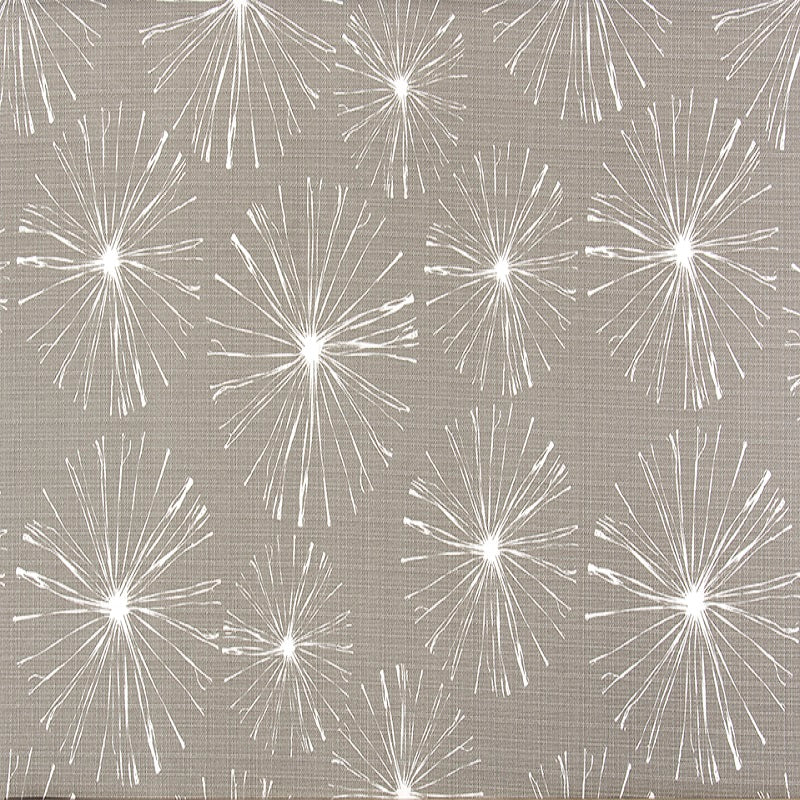 A fabric with a grey background featuring white fireworks-like patterns.