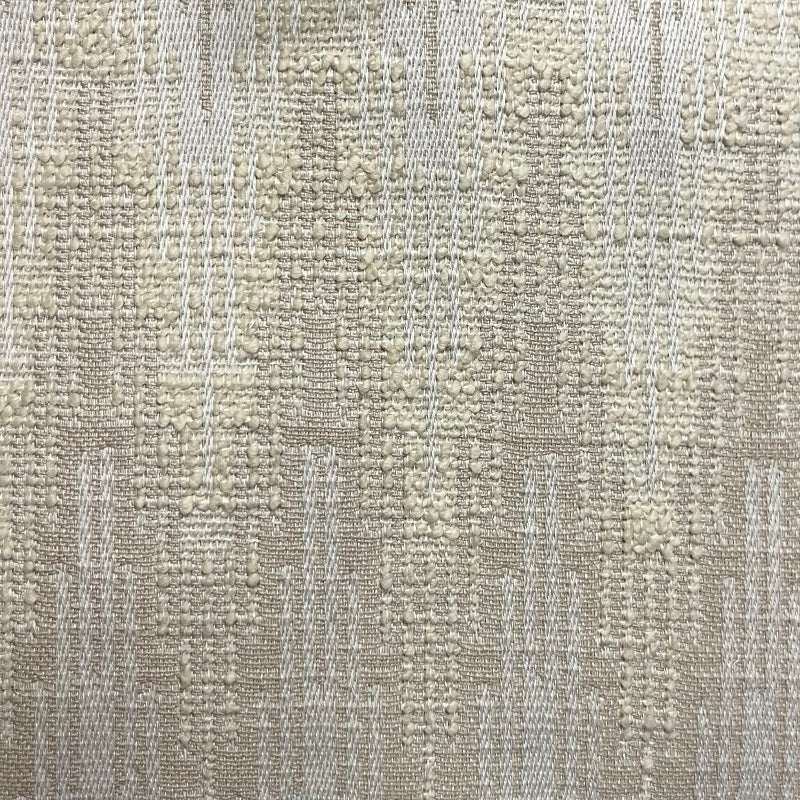 Close-up view of a beige fabric with a solid pattern and no visible texture.
