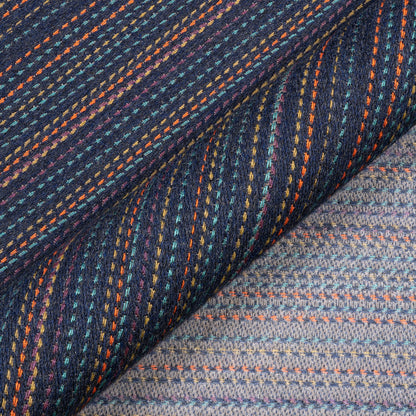 Close-up of textured fabric with multicolored pattern