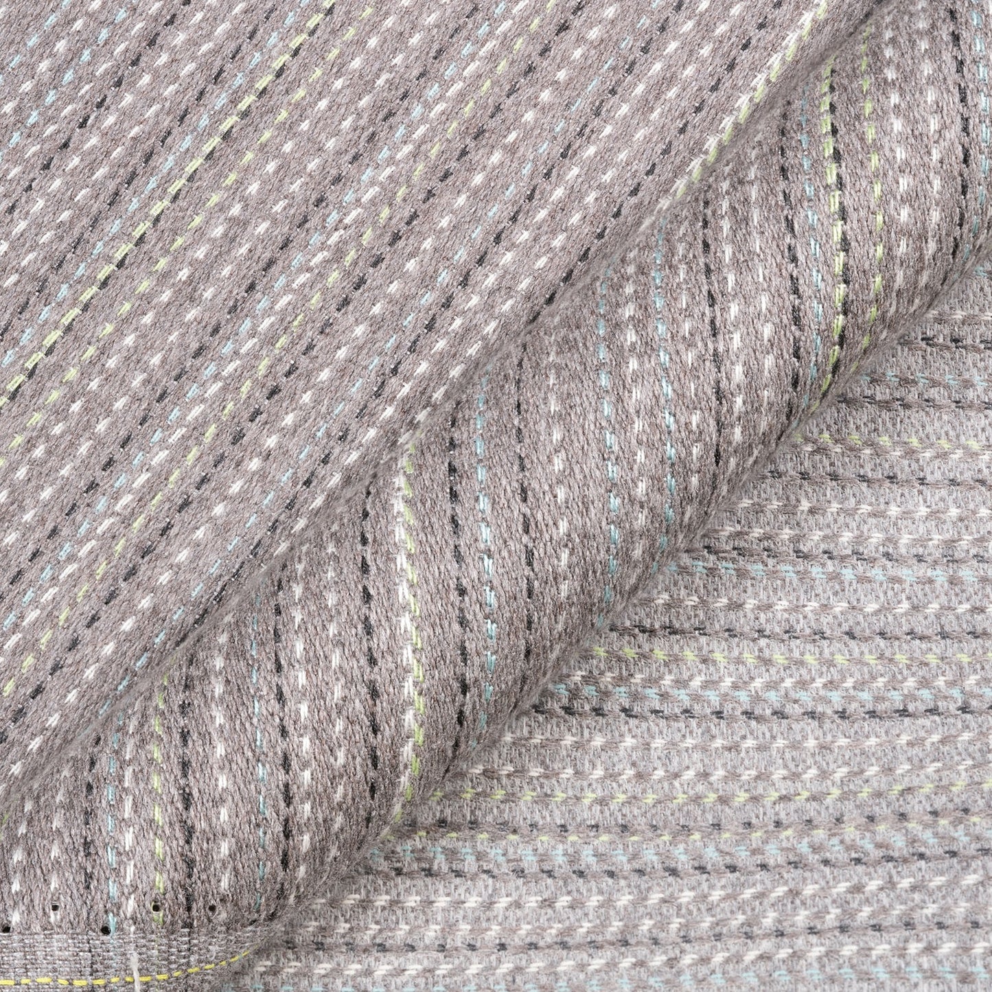 Close-up of gray textured fabric with subtle pattern