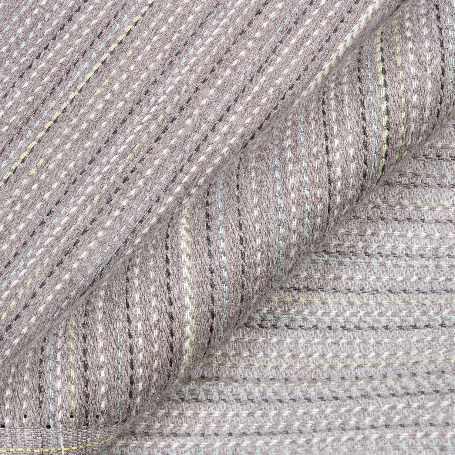 Close-up of gray textured fabric with subtle pattern