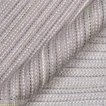 Close-up of gray textured fabric with subtle pattern