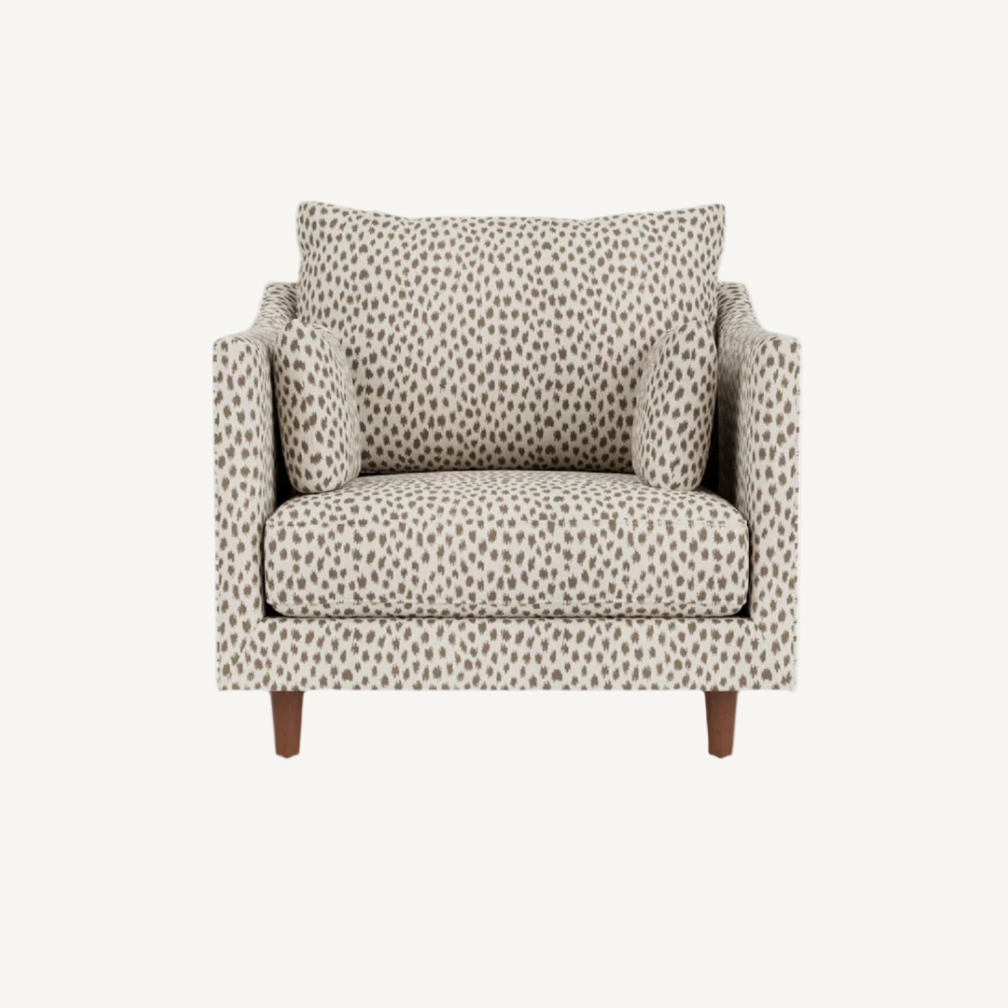 Patterned armchair with a pillow on a white background