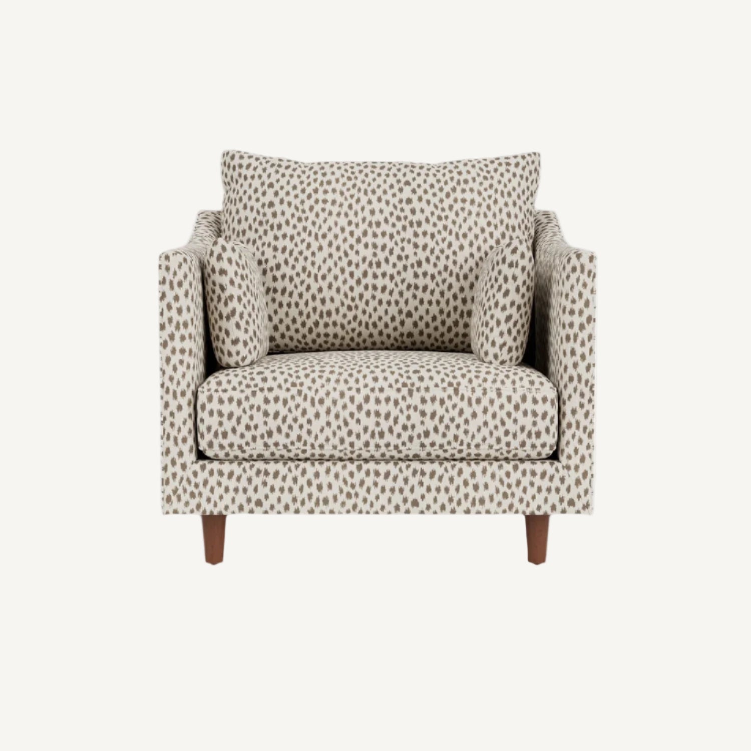 Patterned armchair with a pillow on a white background