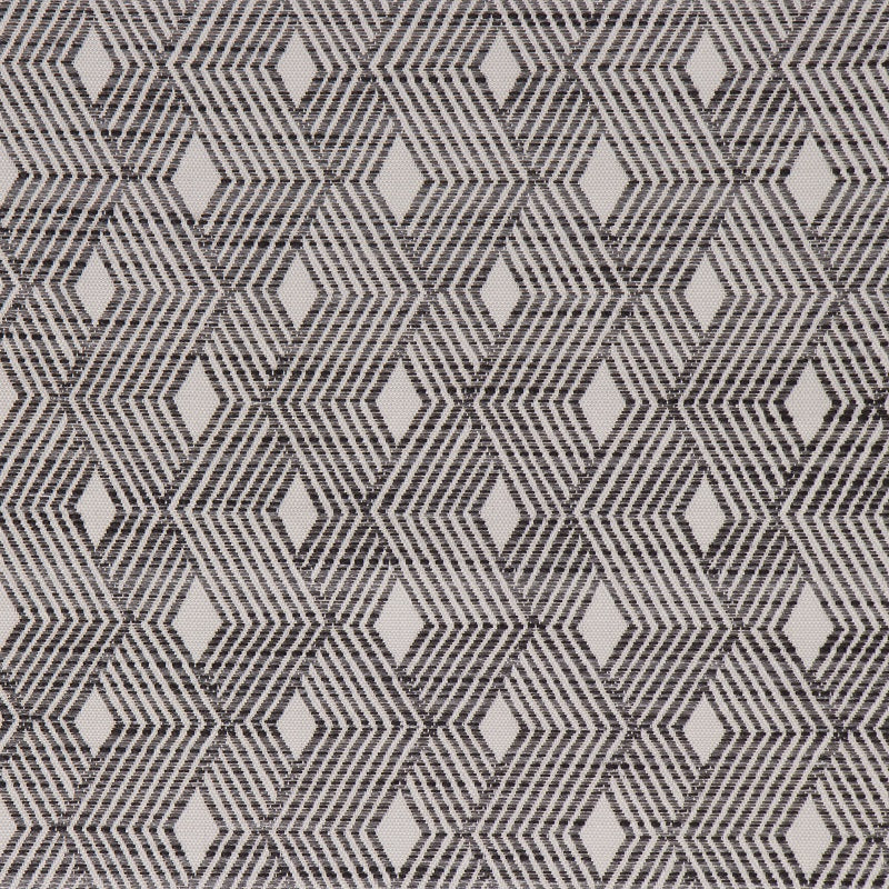 A close-up view of a fabric with a geometric pattern featuring diamond shapes in black and white.