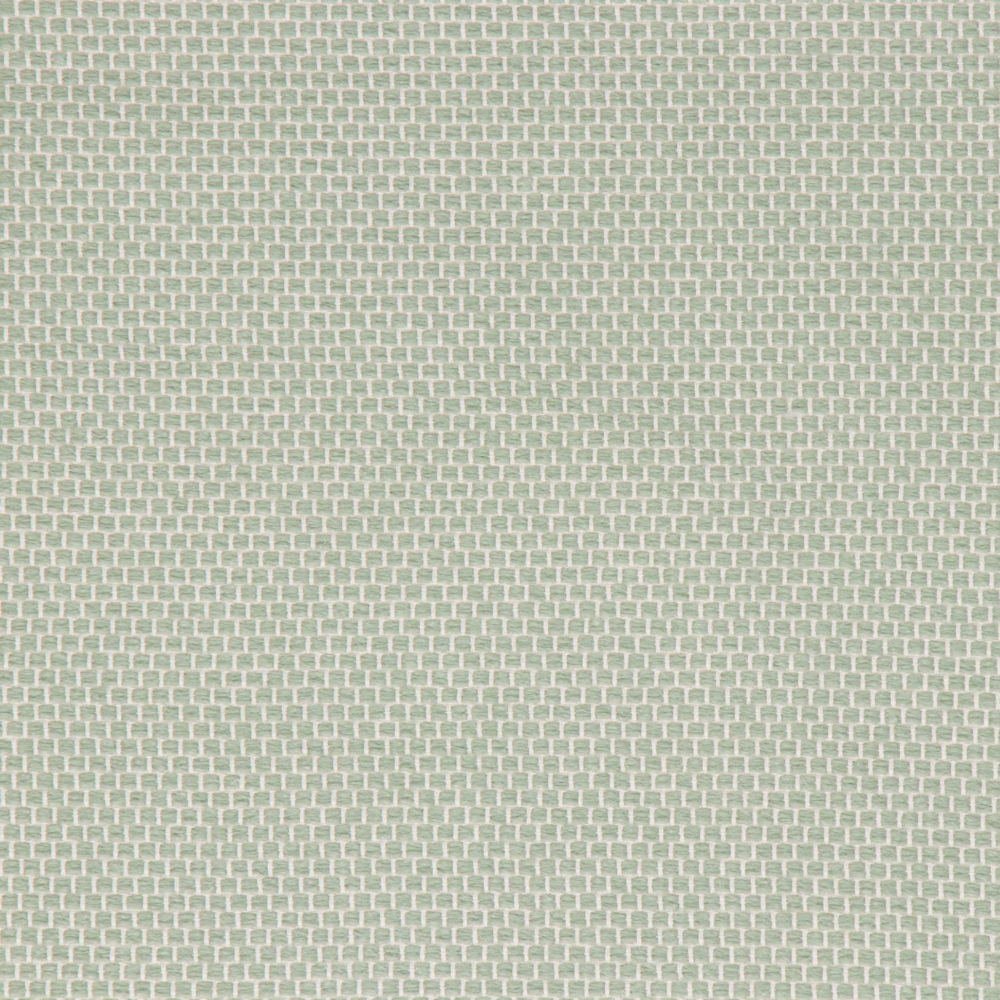 Textured green patterned fabric swatch