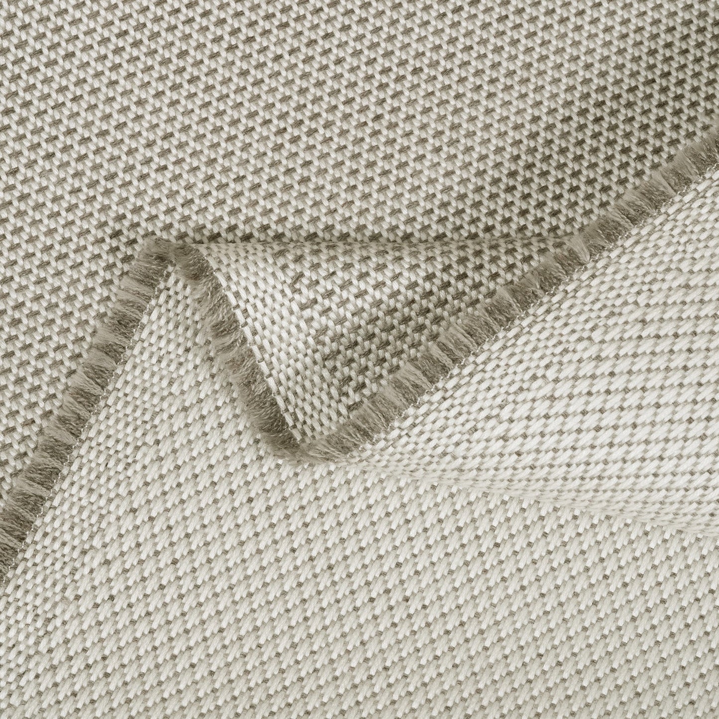 Close-up of a textured fabric with a folded edge
