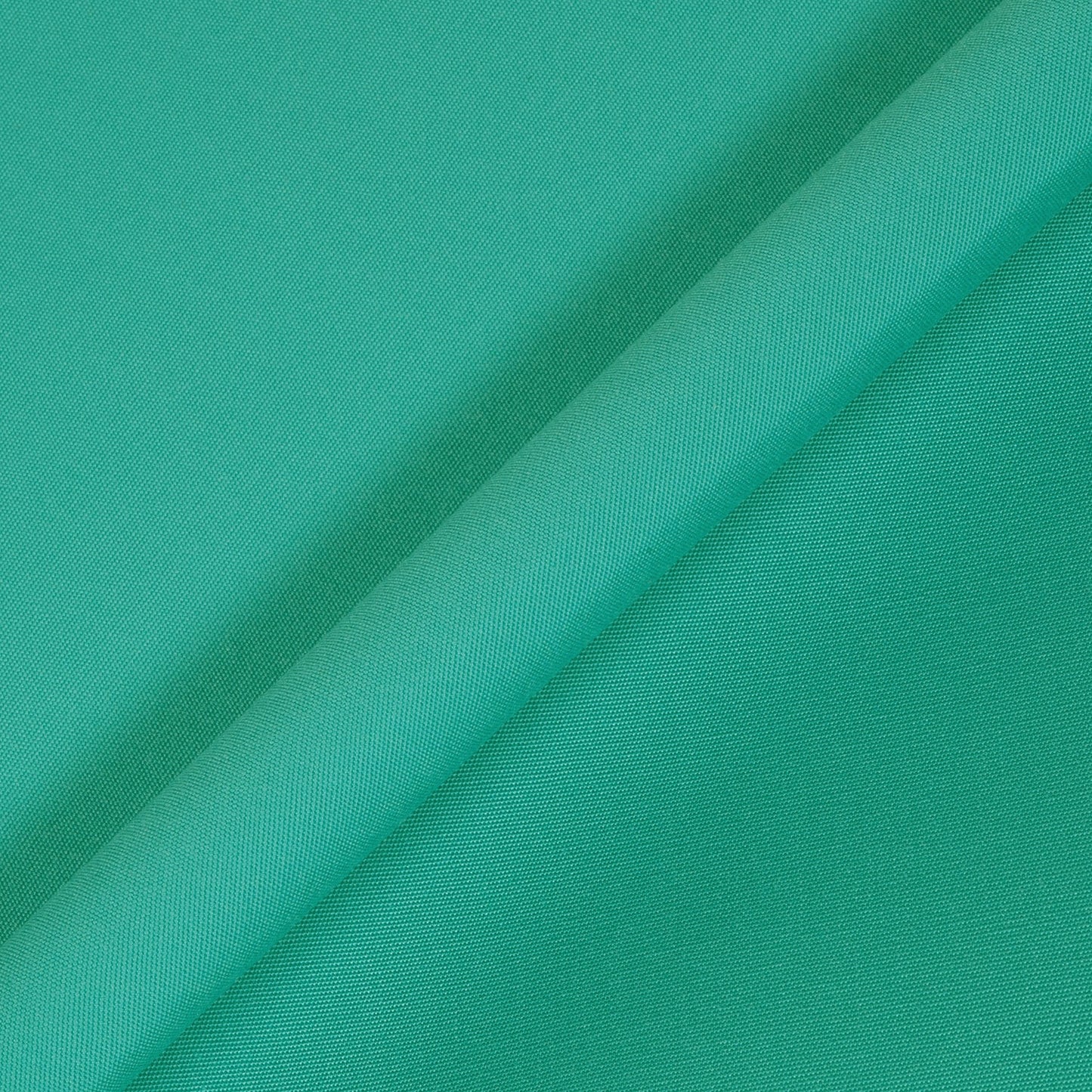 Close-up of teal fabric with a subtle texture