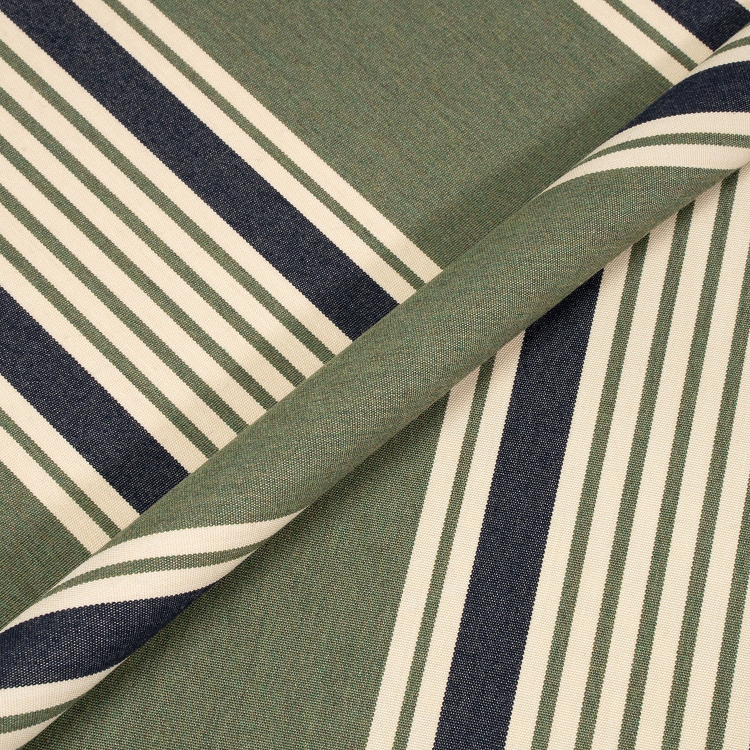 Close-up of striped fabric with green, navy, and beige pattern