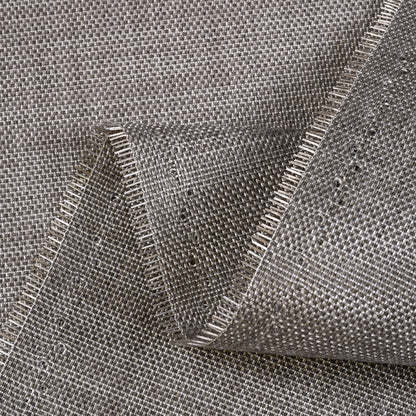 Close-up of gray woven fabric with a clear plastic overlay