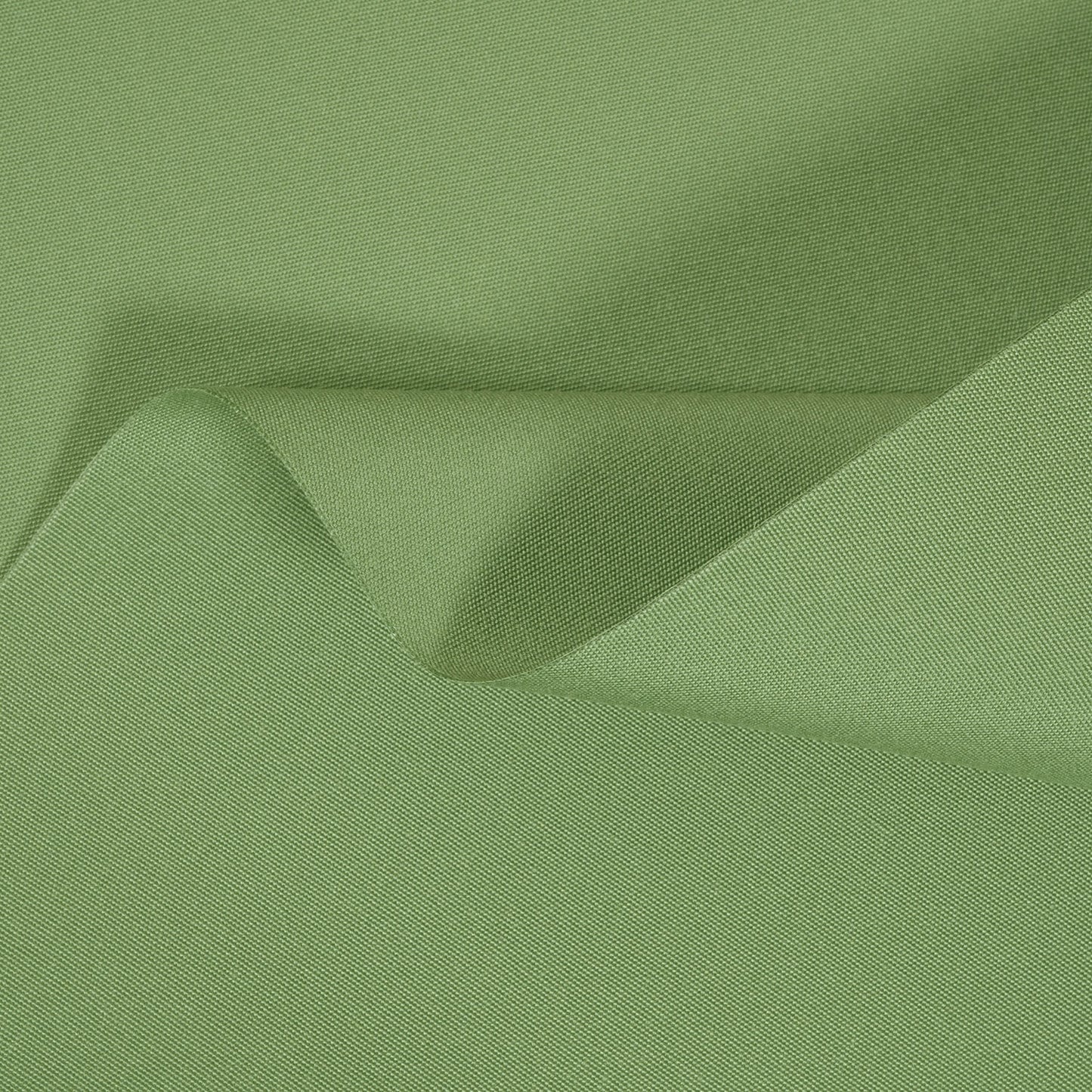 Close-up of green fabric with folds