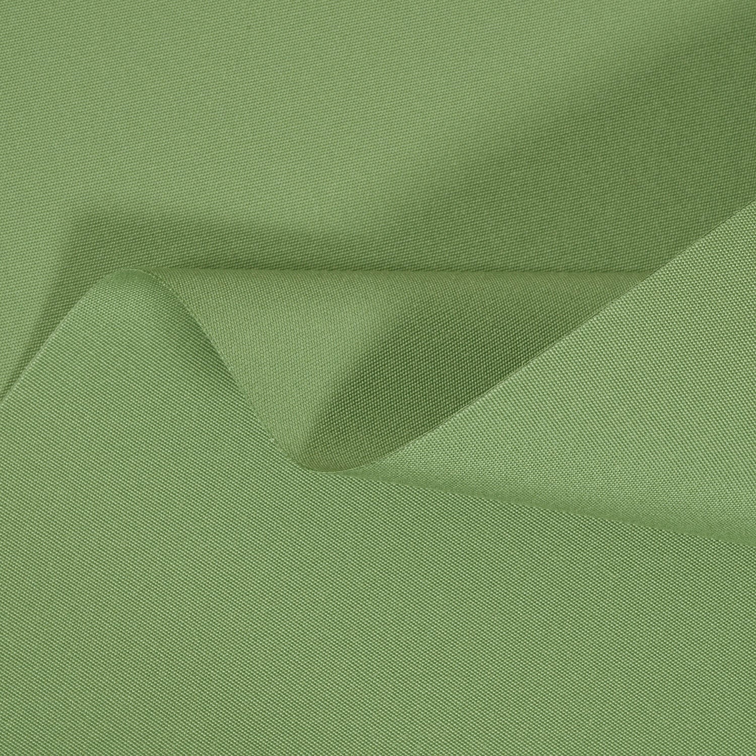 Close-up of green fabric with folds