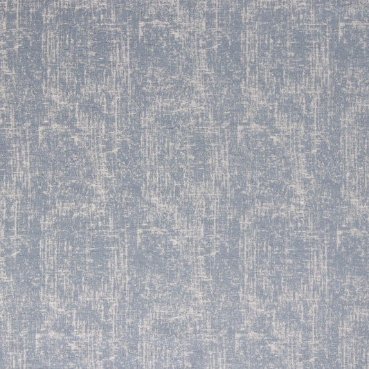 Close-up view of a blue chambray fabric with a textured pattern.
