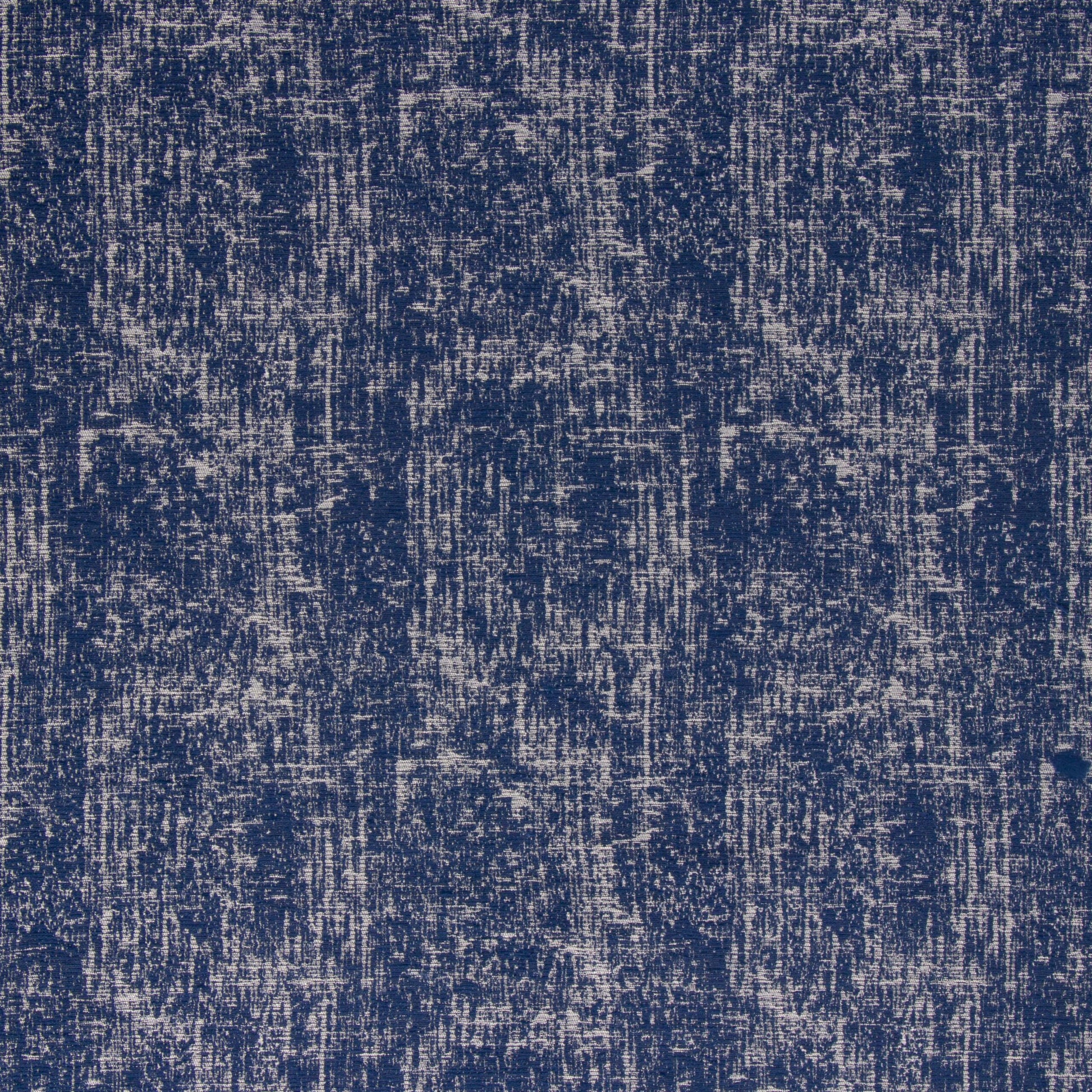 Close-up view of a blue outdoor umbrella fabric with a solid pattern and texture.