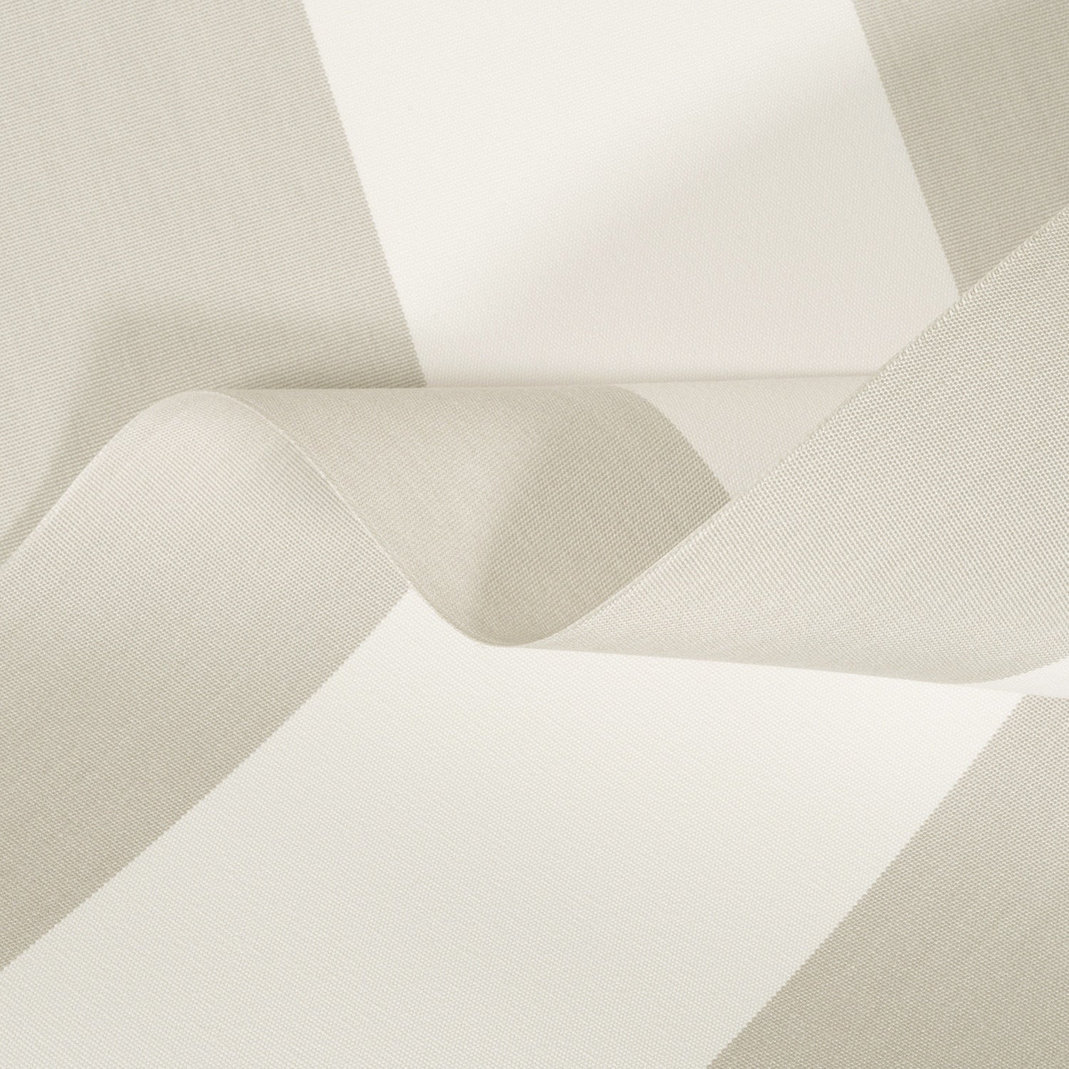 Close-up of beige fabric with a subtle pattern on a white background
