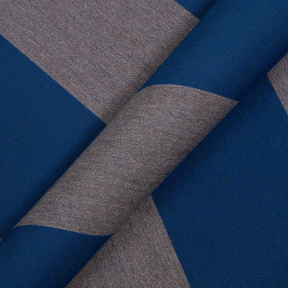 Close-up of blue and gray fabric with a geometric pattern