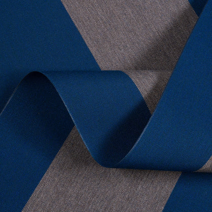 Close-up of blue and gray fabric with a visible pattern