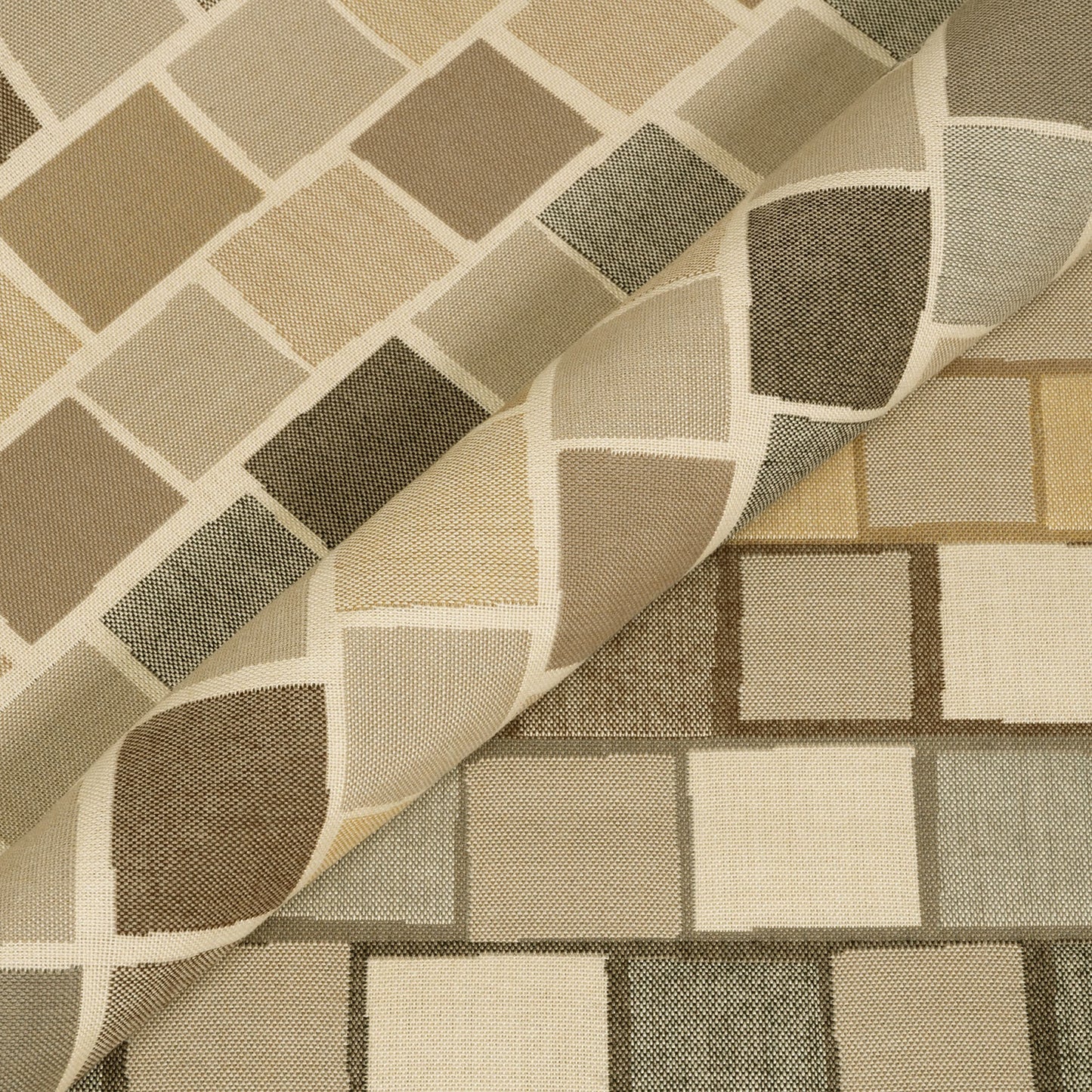 Close-up of patterned fabric with geometric design in beige, brown, and gray.