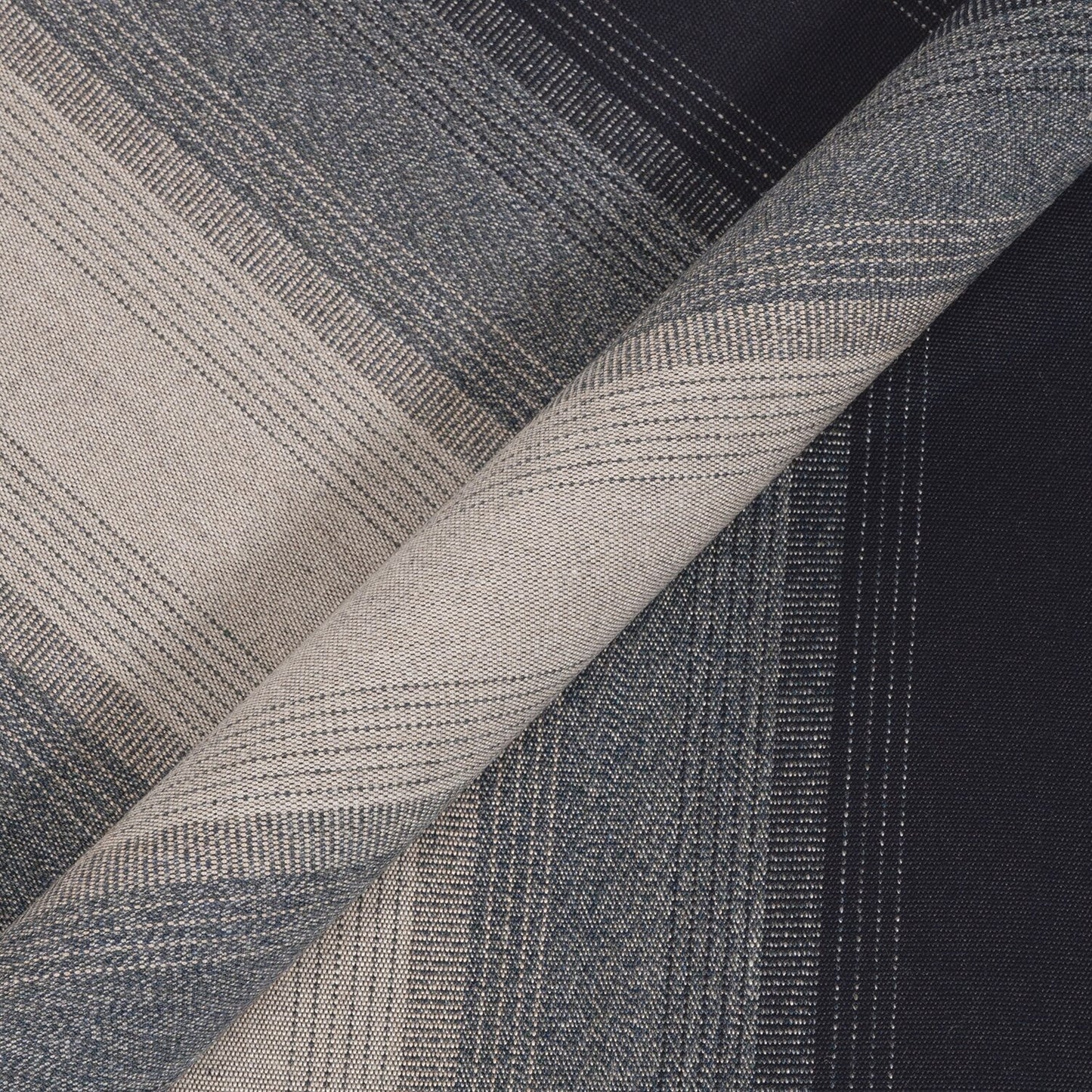 Close-up of textured fabric with gray and black patterns