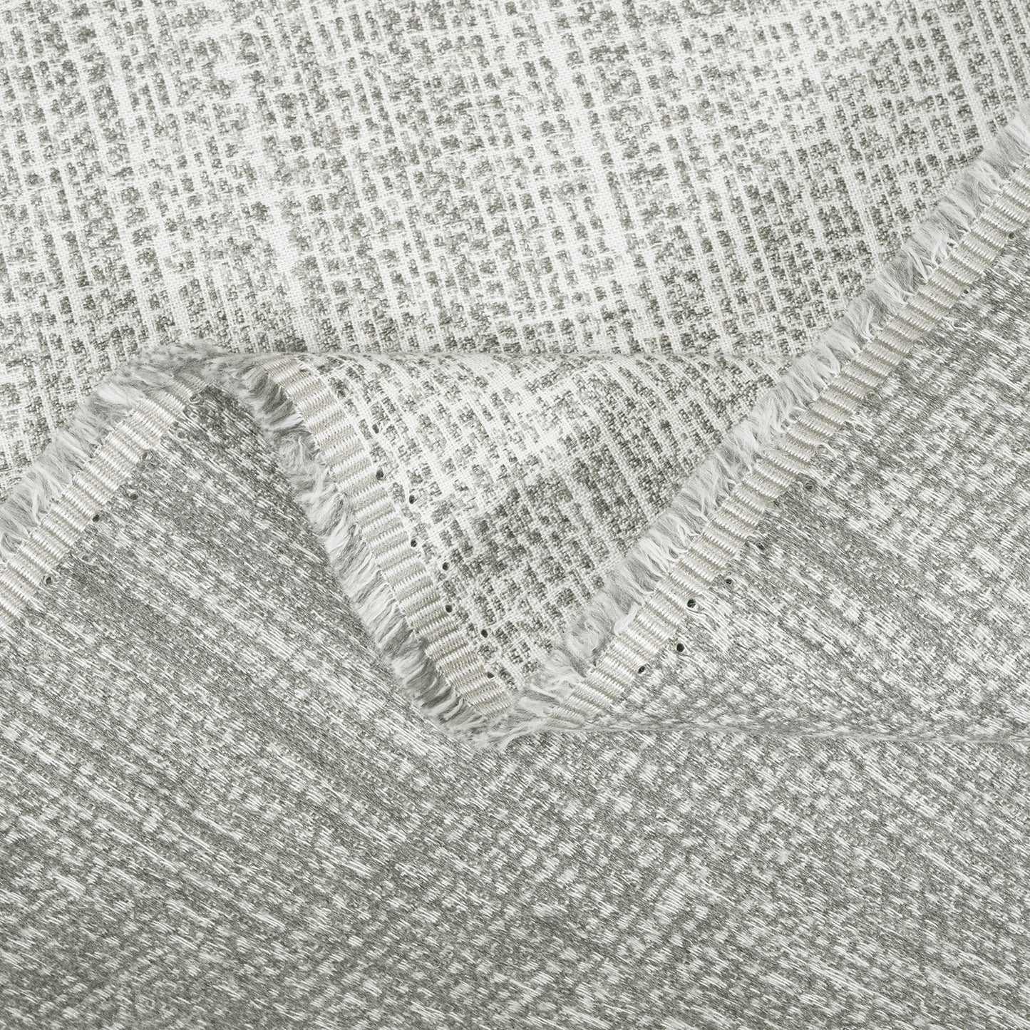 Close-up of textured gray fabric with a subtle pattern
