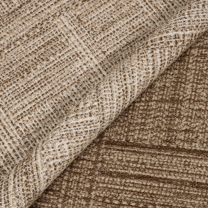 Close-up of textured brown fabric with a subtle pattern