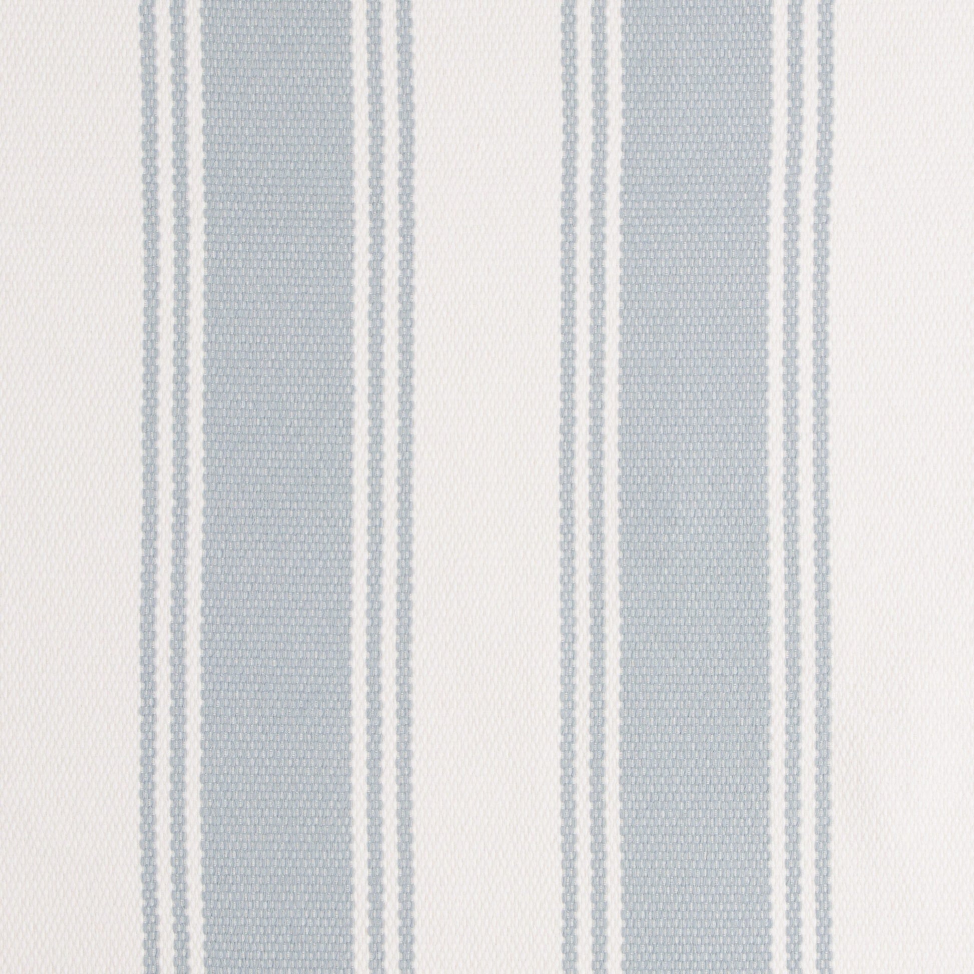 A striped pattern fabric in blue and white colors, likely used for outdoor upholstery.