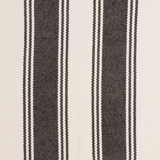 Textured fabric with black and white stripes on a beige background