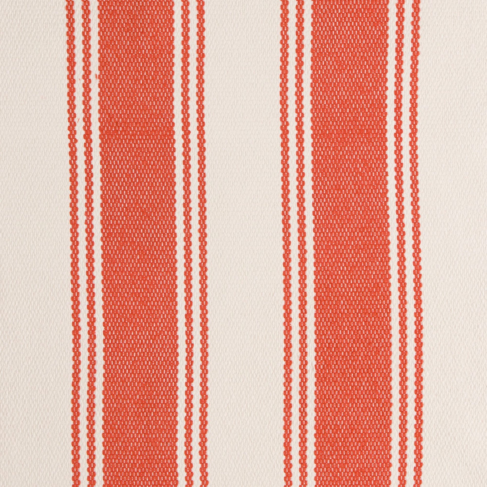 Fabric with red and white vertical stripes on a beige background