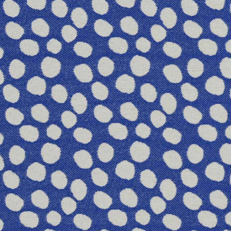 Pattern of white polka dots on a blue background