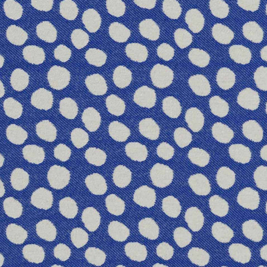 Pattern of white polka dots on a blue background