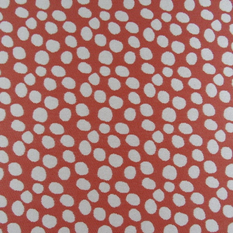 Pattern of white dots on a red background