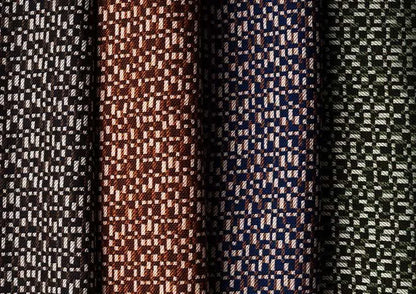 Three fabric swatches with different patterns and colors.