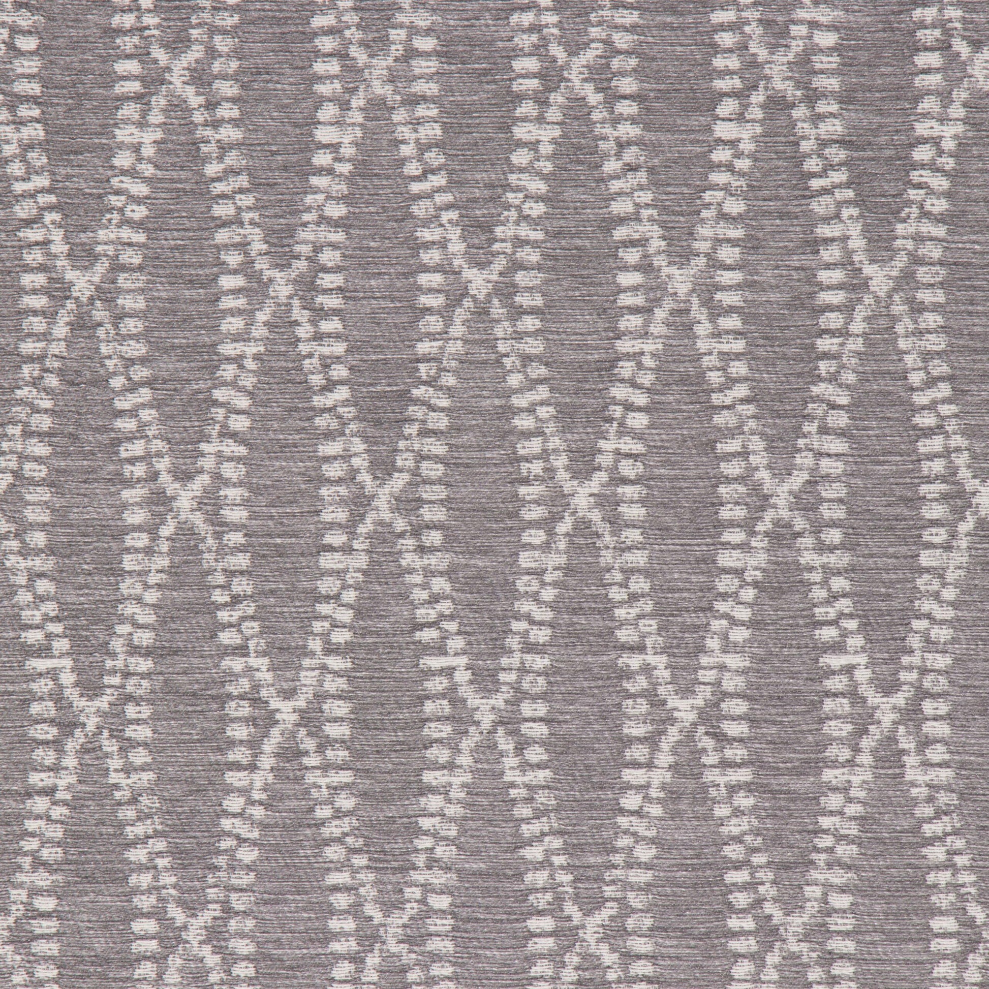 A close-up image of a textured fabric in gray color with a geometric pattern.