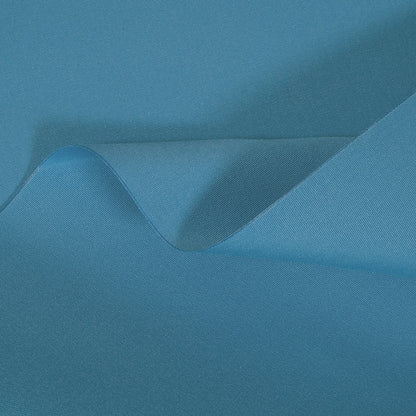 Teal fabric with a subtle texture and fold