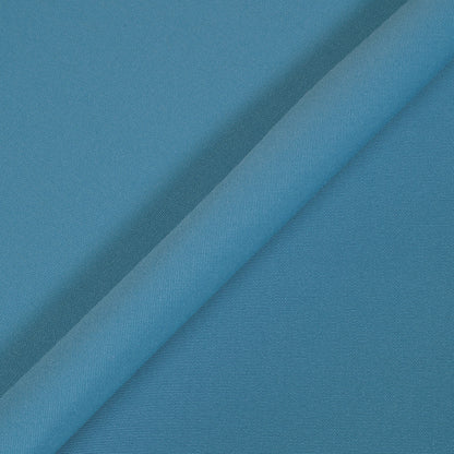 Blue fabric with a subtle texture and pattern